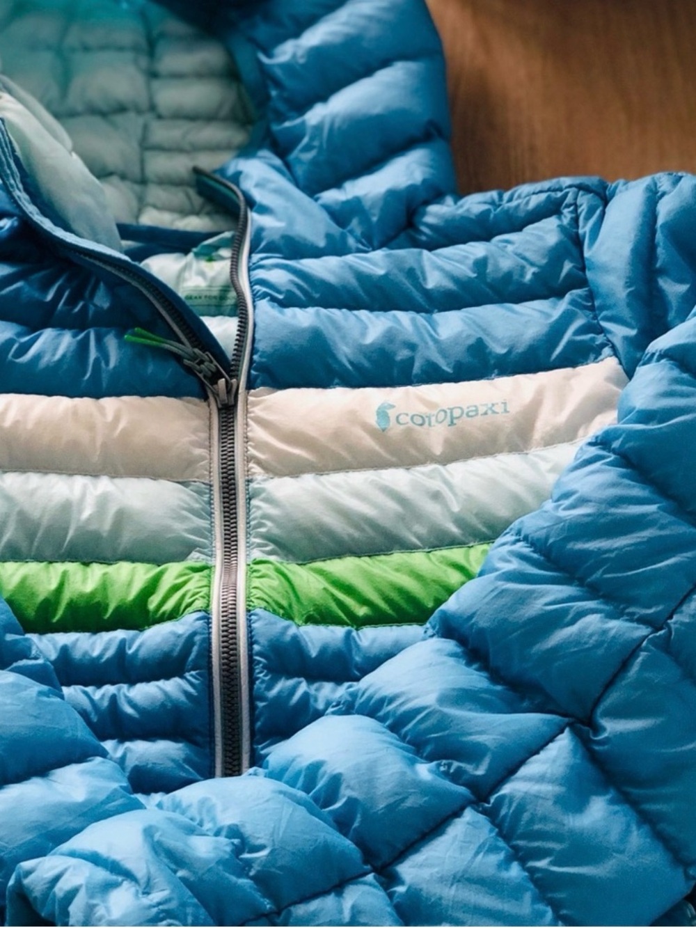 cotopaxi light blue and aqua kids puffer jacket